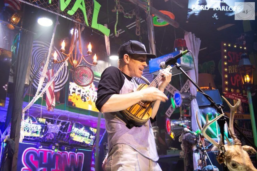Ryan Today on stage with a ukulele